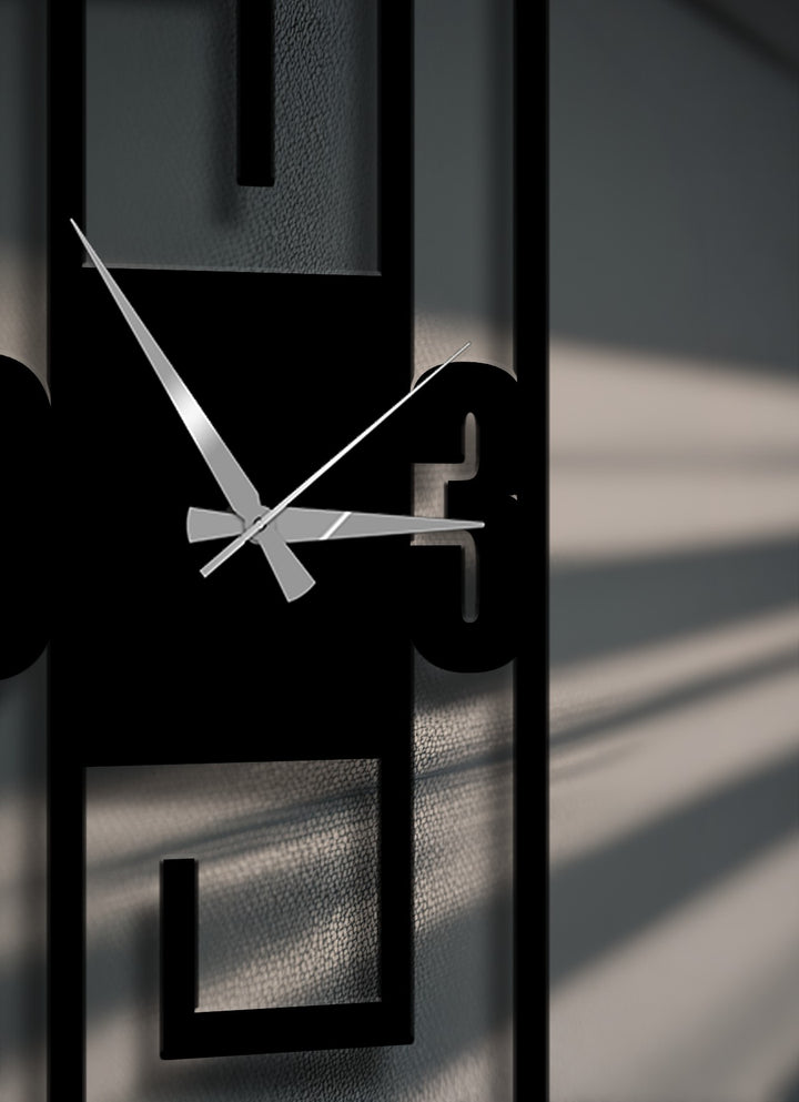 The superior material quality of this decorative metal art wall clock showcases a sleek black finish and precise geometric frame.