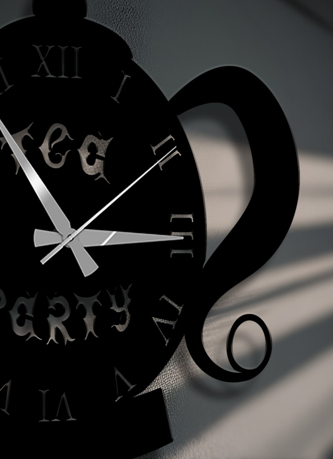 The layered depth of this black teapot metal wall decor is highlighted by deep shadows, emphasizing the vintage Roman numerals and intricate shape.