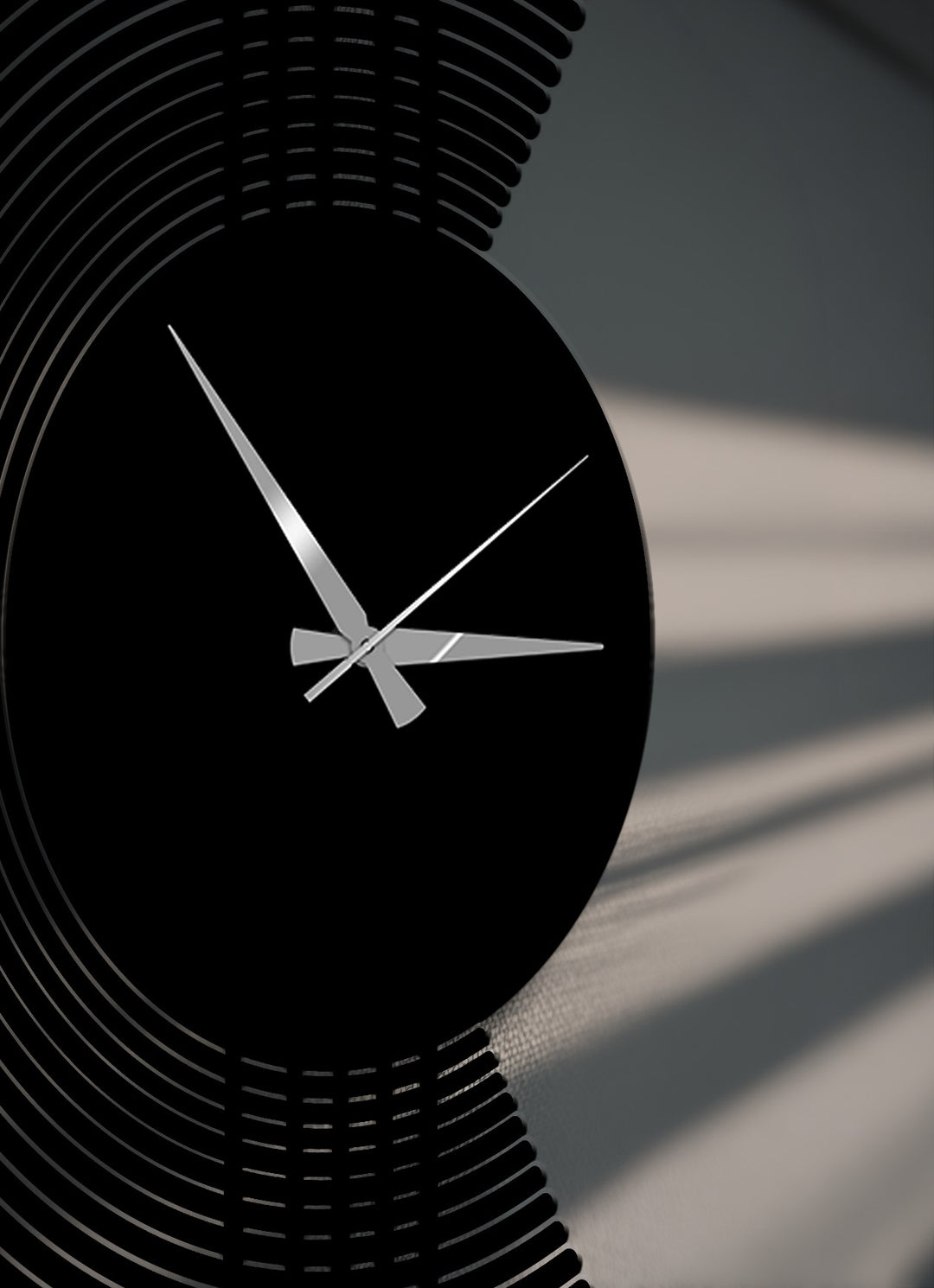 Dramatic light and shadow patterns highlight the sleek, modern arc line metal clock, a captivating decoration wall art piece.