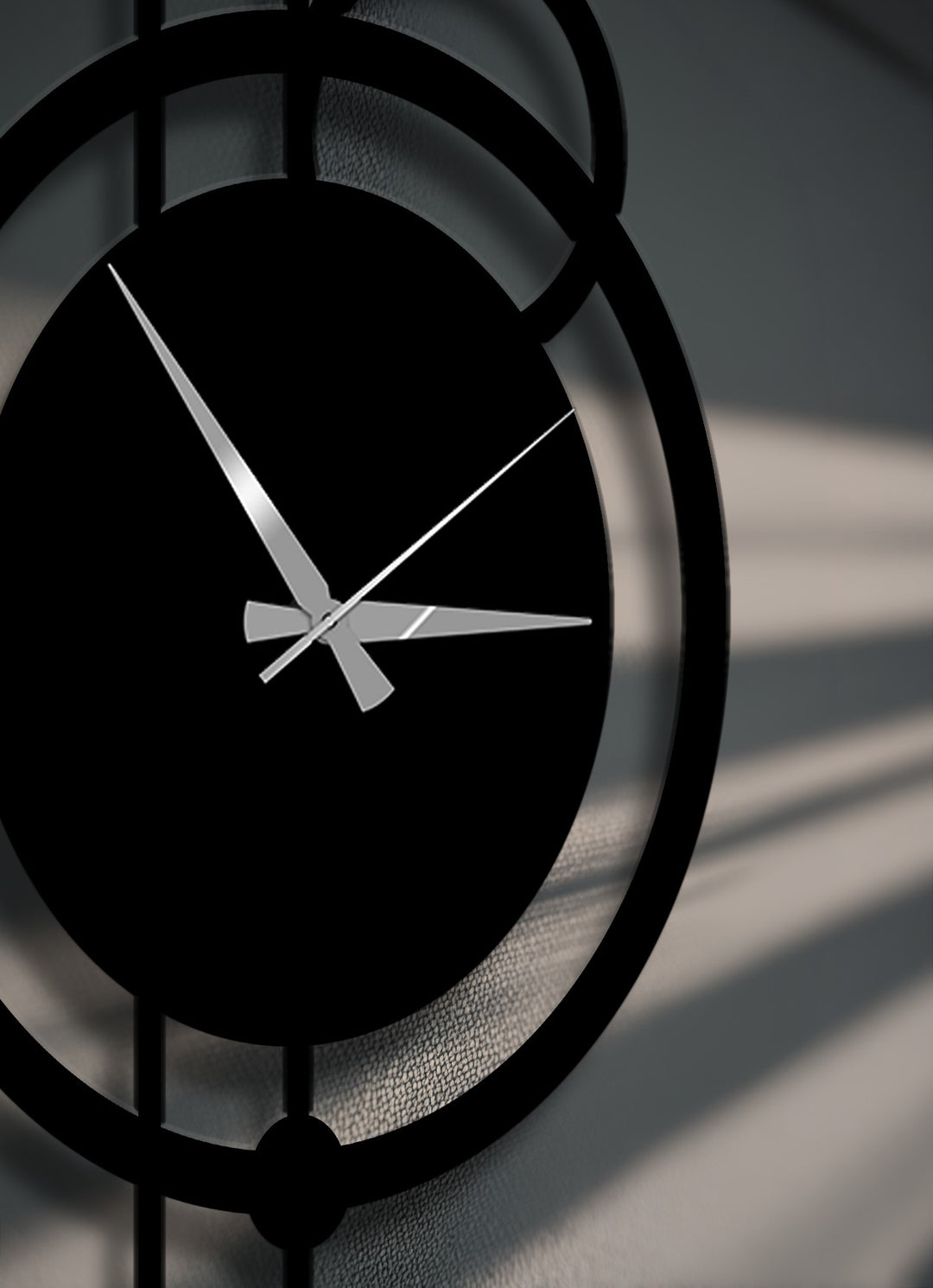 The subtle transition from deep black to soft grey in this abstract orbit metal wall clock highlights its modern design, ideal as decoration wall art.