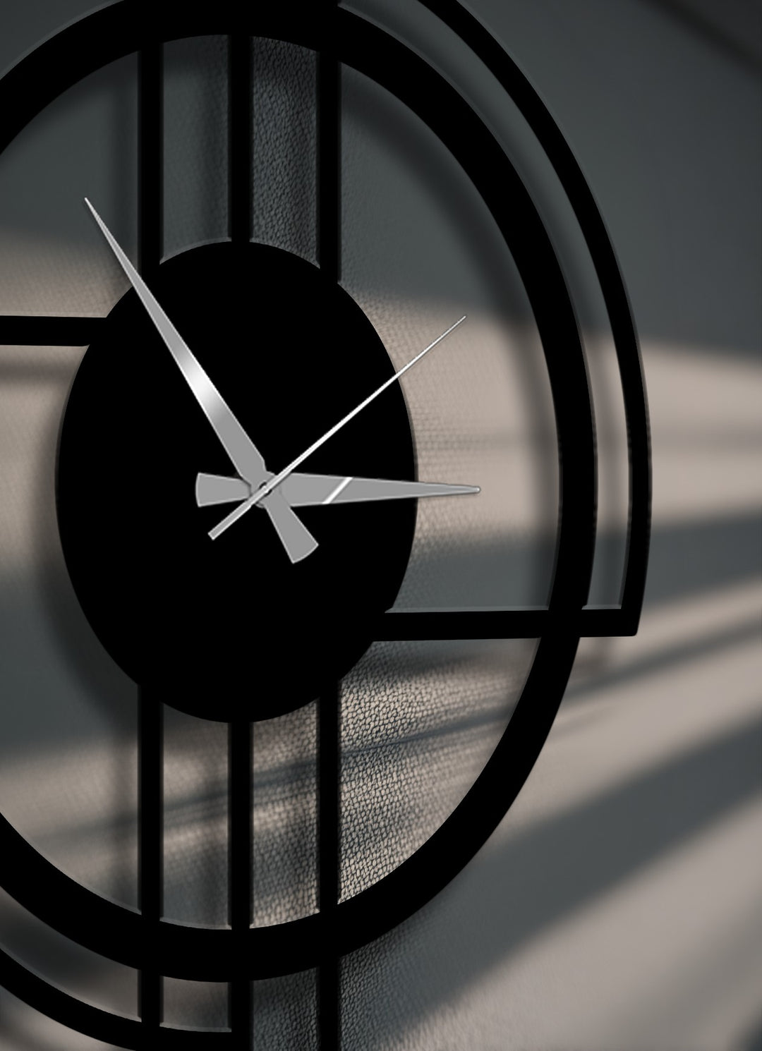 The striking silver hands on a bold black metal wall clock with a geometric circle frame create a captivating decoration wall art piece.