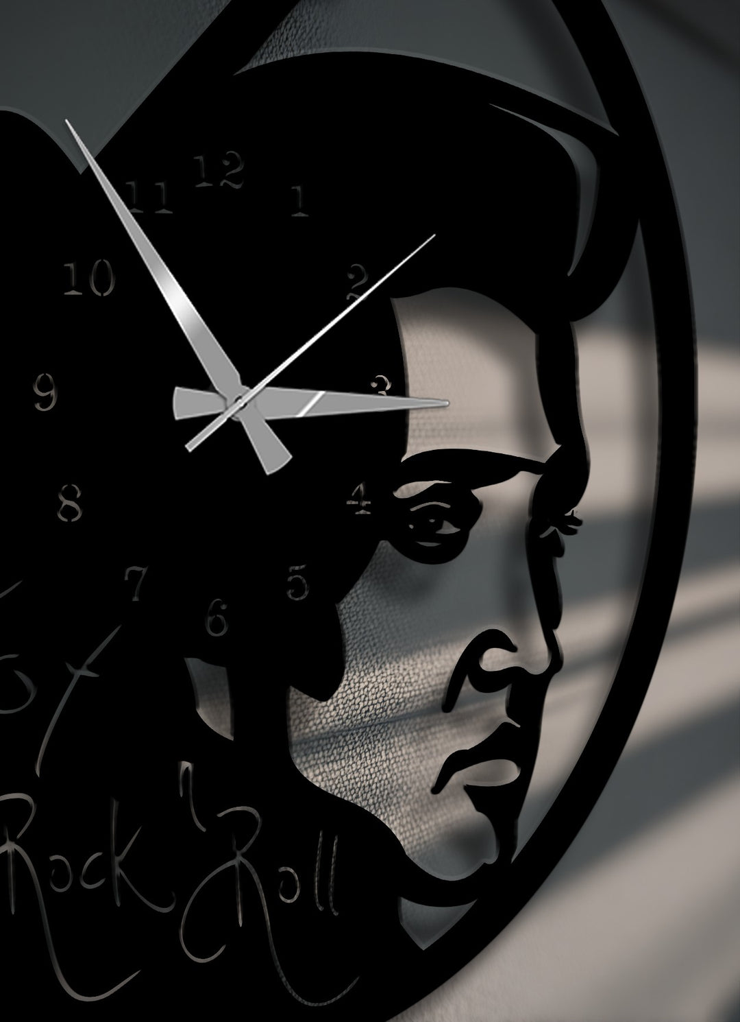 The negative space in this striking Elvis Presley metal art for wall clock highlights his iconic silhouette and rock 'n' roll motto.