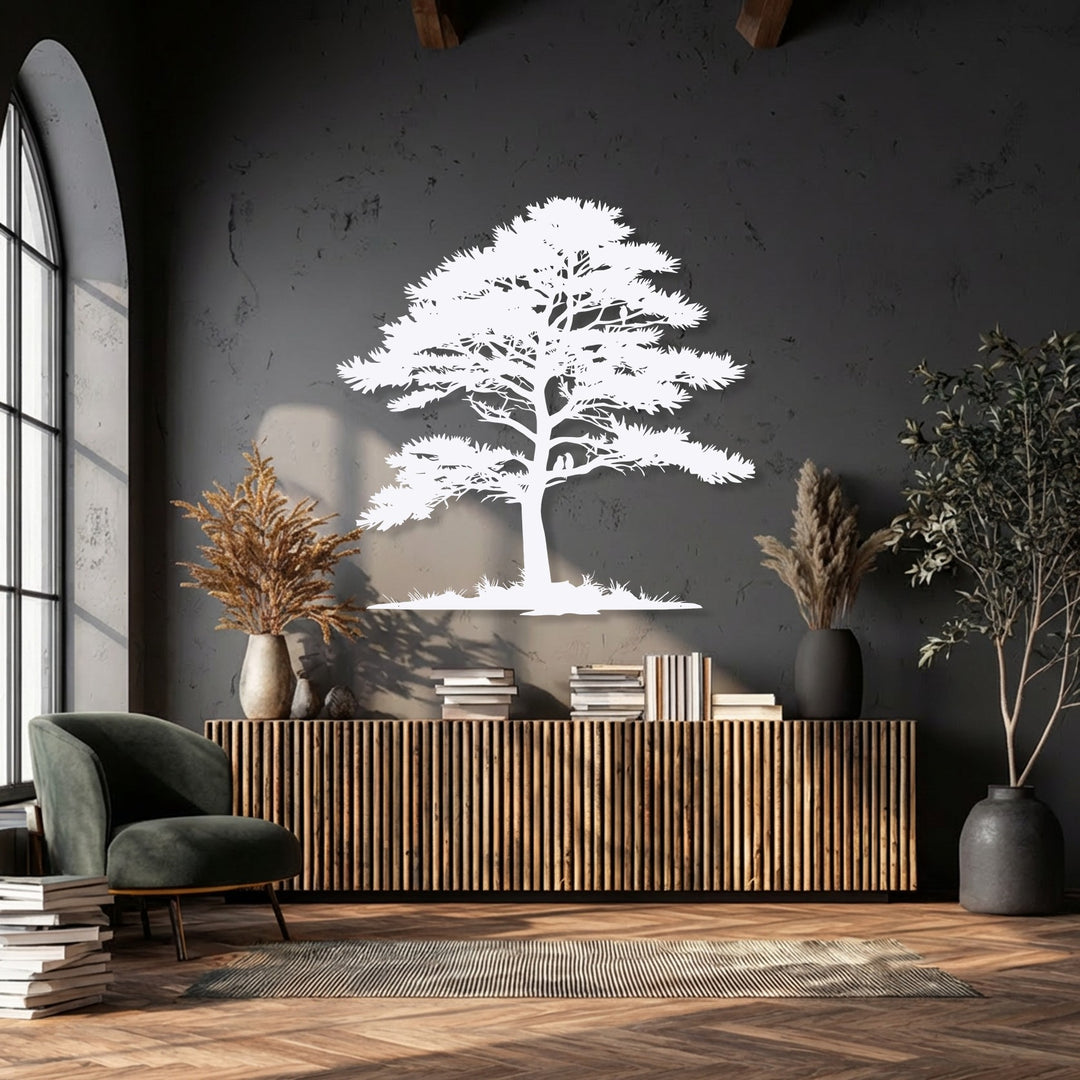 The stark white pine tree silhouette metal wall decor strikingly contrasts with the dark charcoal gray wall above a warm wooden console.