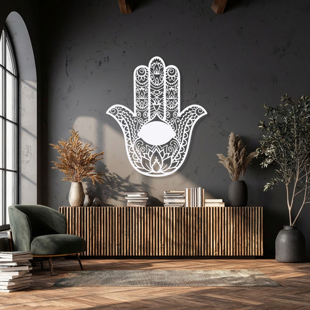 The precisely cut, ornamental decorative metal art of the Hamsa hand with an evil eye exudes exceptional material quality.