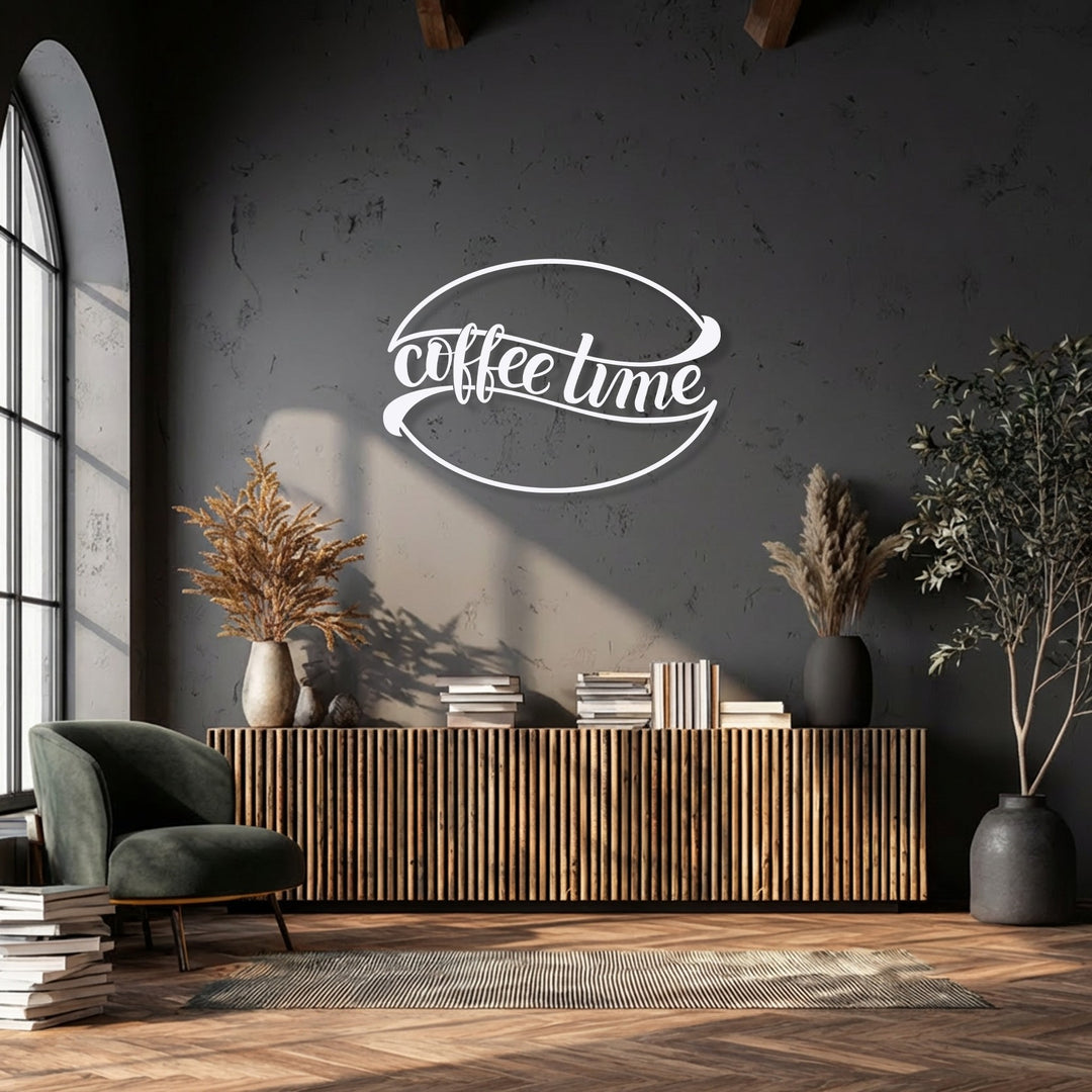 A deep emerald armchair, stacked books, and a striped rug on a wooden floor define the foreground, complemented by unique metal wall art.
