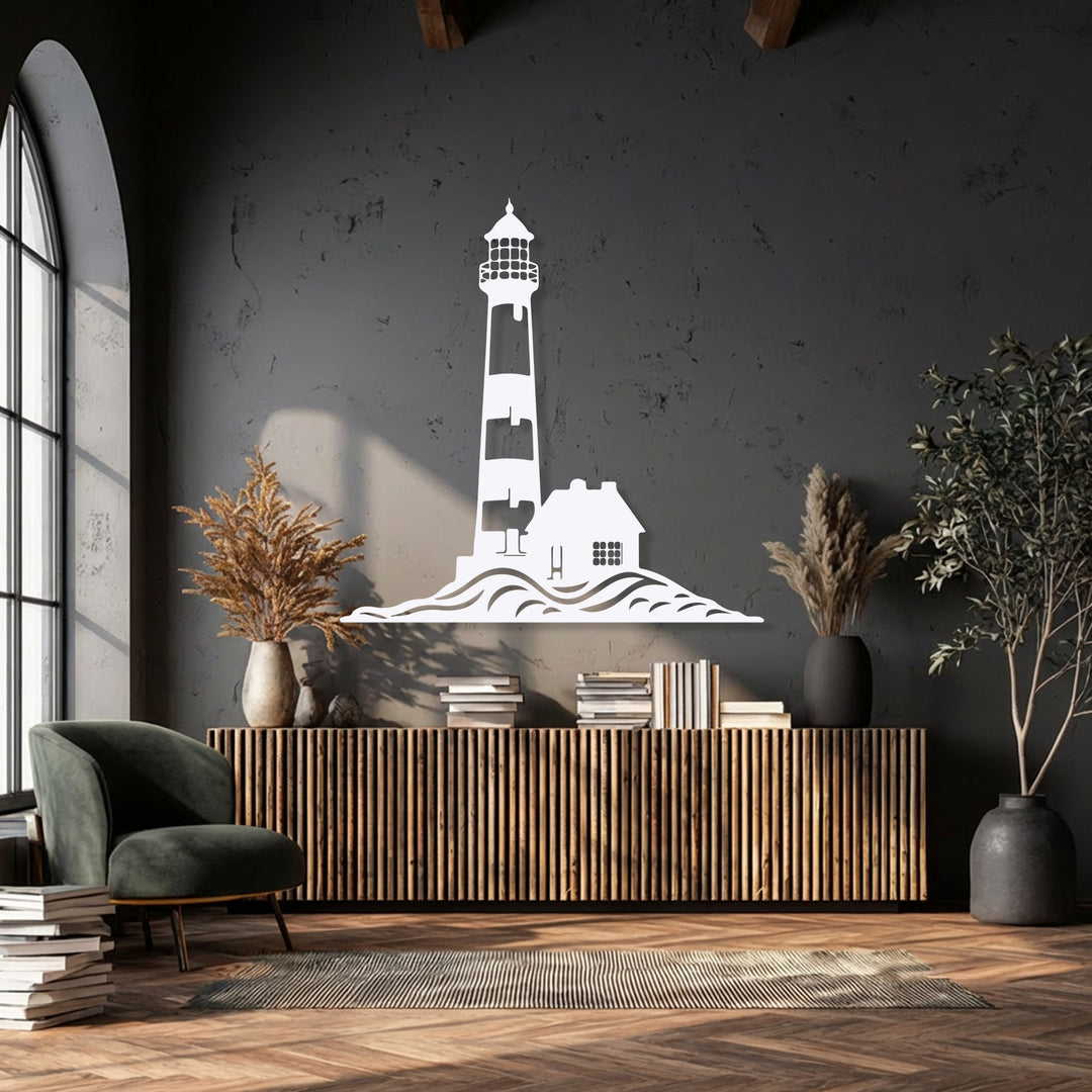 The dramatic color contrast of the luminous white coastal lighthouse metal wall decor against the deep charcoal wall creates a striking nautical focal point.