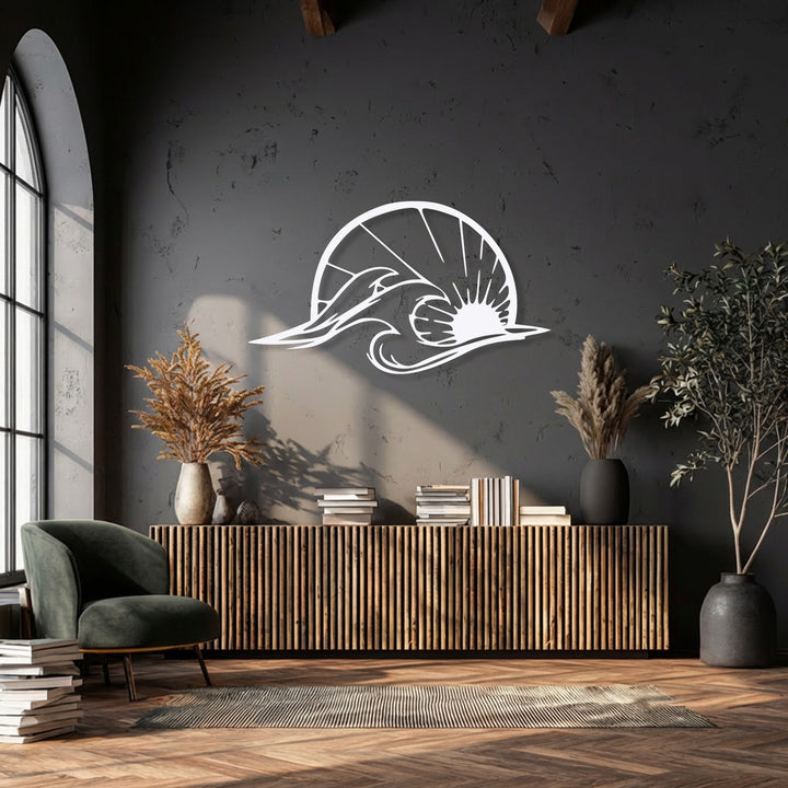 The realistic detail of the decorative metal art beautifully captures a dolphin leaping an ocean wave and a radiant sun in a modern coastal room.