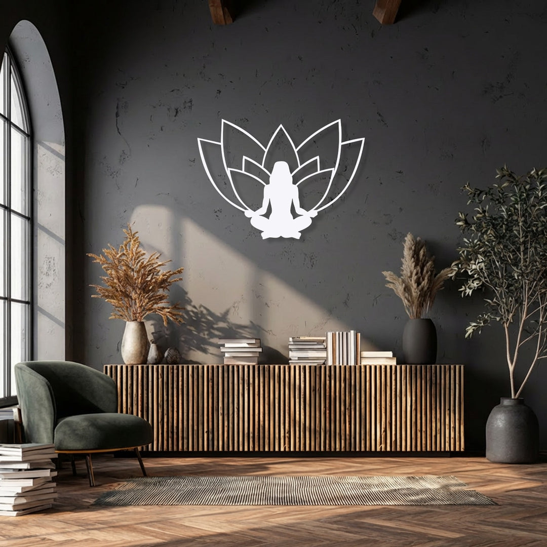The stillness of the room is reflected in the white lotus meditation silhouette, a unique metal wall art piece, evoking a sense of calm zen.
