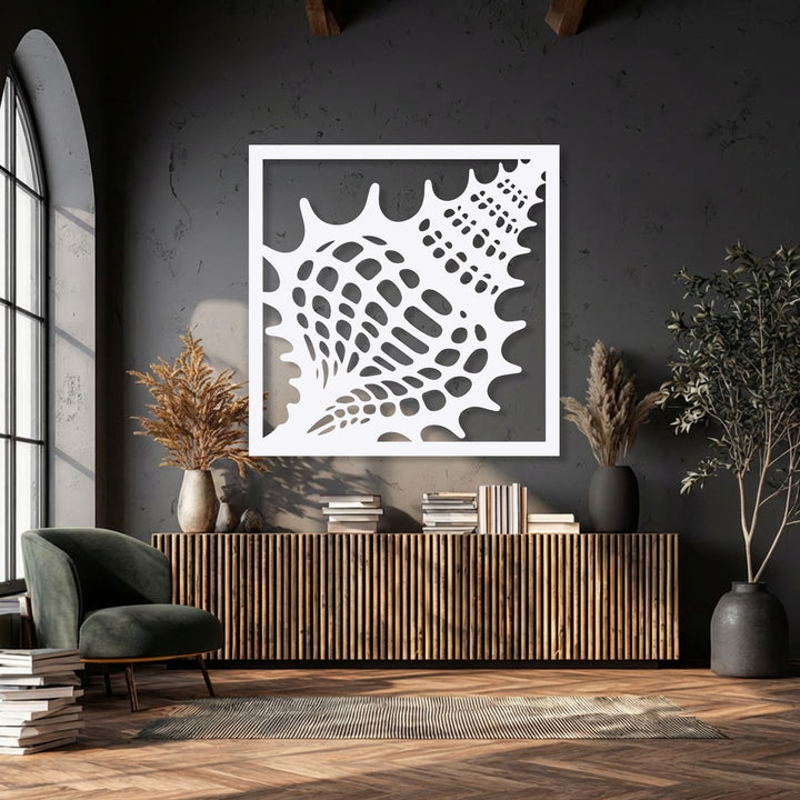 The striking white seashell frame metal decoration wall art, featuring an intricate organic texture, dominates the dark accent wall.