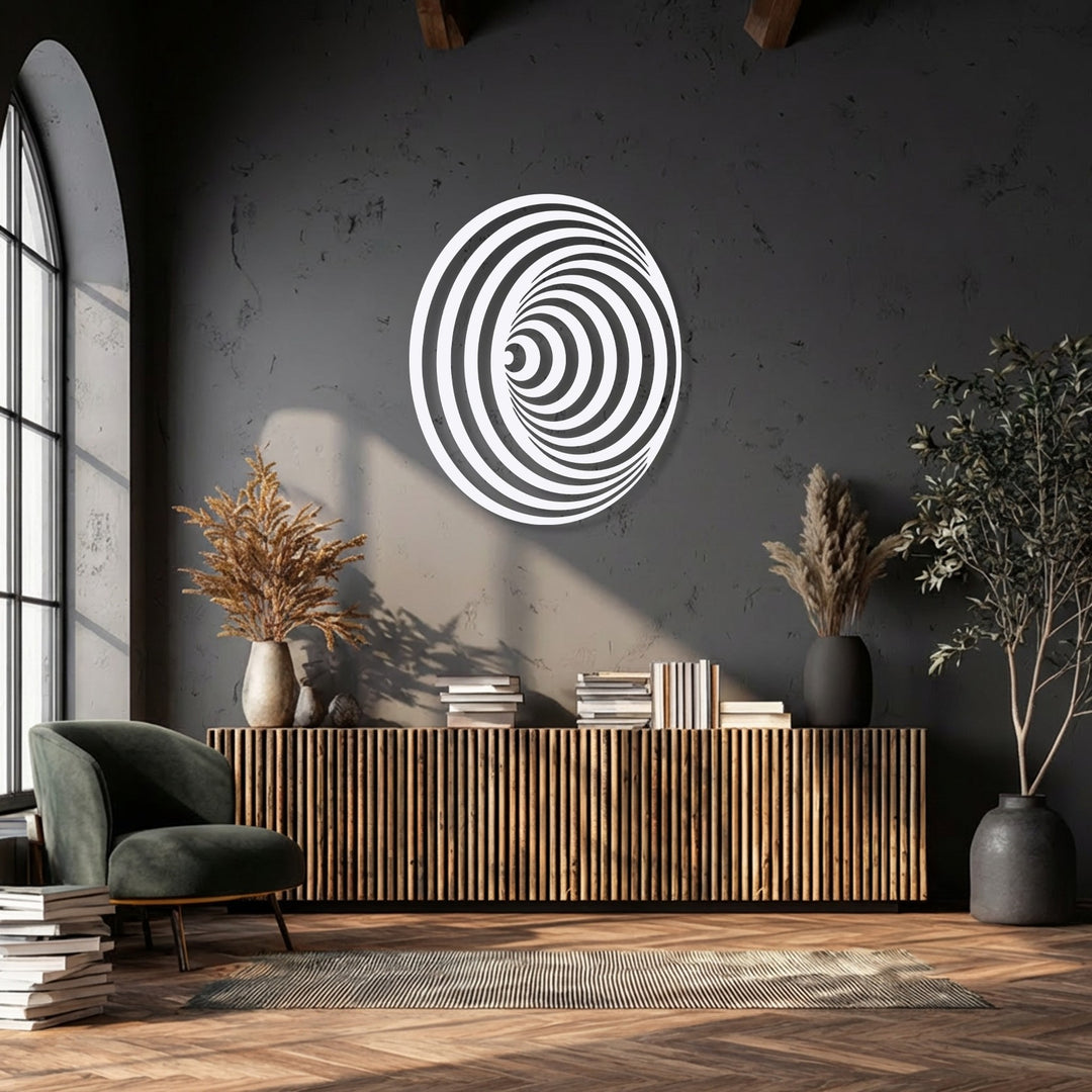 The dynamic, organic forms of the hypnotic spiral circle metal artwork visually pull viewers into its depth, enhancing the room's elegant aesthetic.
