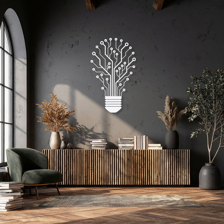 The crisp white finish of the unique metal wall art, featuring a Tech Tree Lightbulb design, creates a stark contrast.
