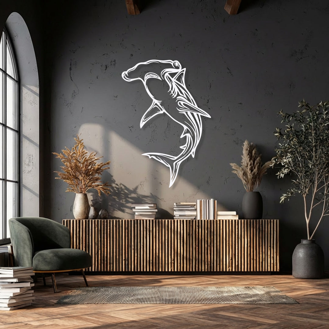 The striking white matte finish of this Hammerhead Shark Metal Wall Art creates a captivating decoration wall art piece.