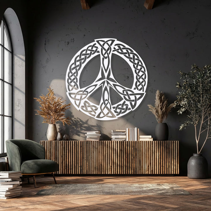 The striking Eternal Peace Celtic Knot Peace Symbol metal artwork is the prominent focal point on the dark wall.