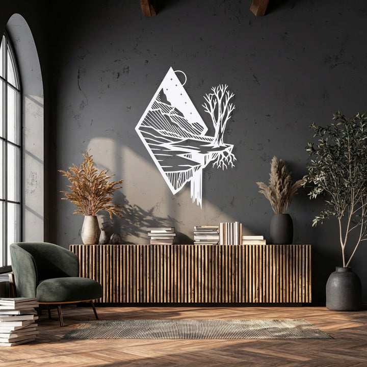 The desaturated image highlights a striking white floating mountain metal wall decor against a dark, textured wall, creating a minimalist contrast.