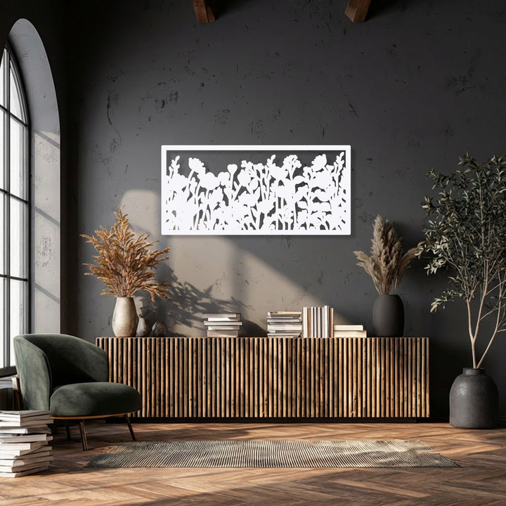 Dominantly charcoal gray room with a modern white wildflower silhouette metal decoration wall art and botanical garden design.