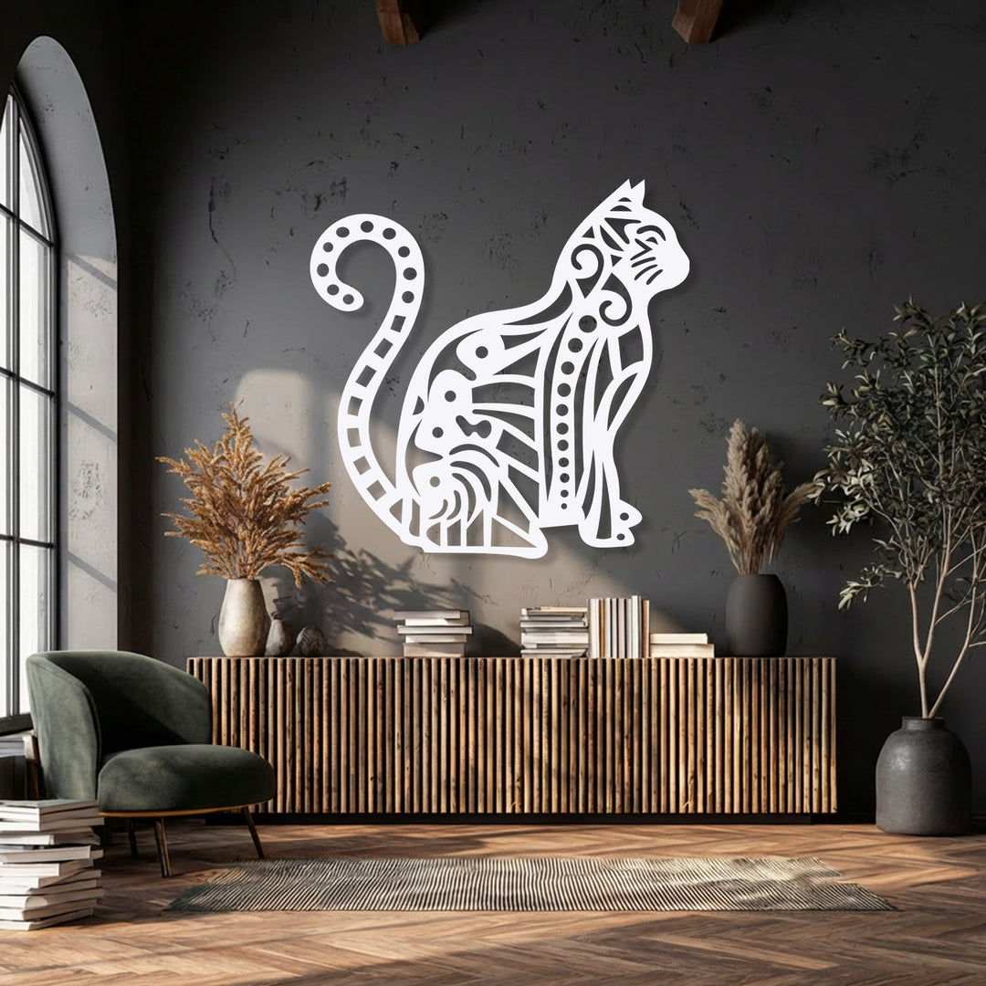 The realistic detail of this ornamental cat silhouette metal artwork reveals intricate patterns against a dark, textured wall.