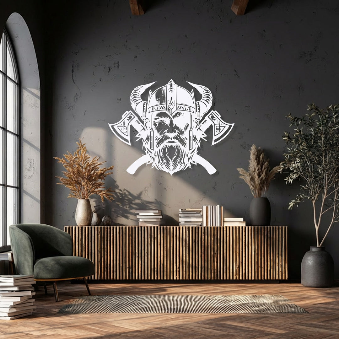 A commanding white Viking warrior with a horned helmet and crossed axes stands out as a unique metal wall art piece against a dark gray wall.