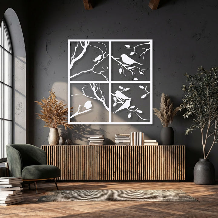 The visual rhythm of four panel bird silhouette decorative metal art creates a harmonious nature window frame decor against a dark wall.