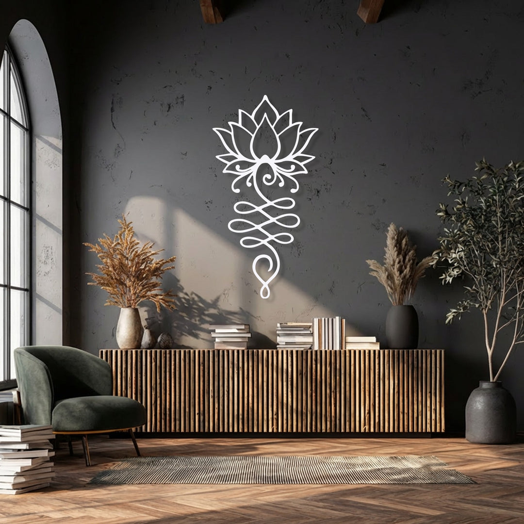 The foreground details reveal a plush dark green armchair, stacks of books, a striped rug, and warm wooden flooring, complementing the metal wall decor.