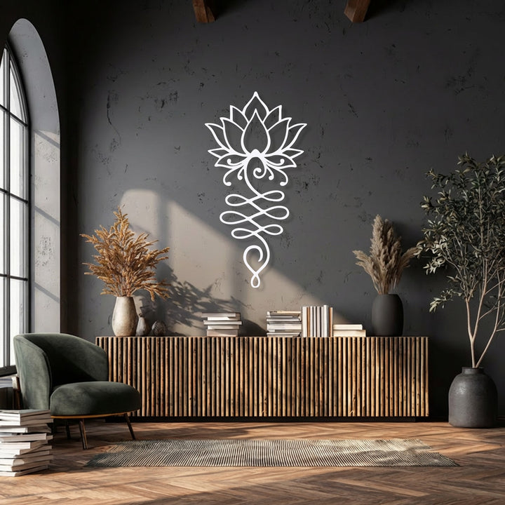 The foreground details reveal a plush dark green armchair, stacks of books, a striped rug, and warm wooden flooring, complementing the metal wall decor.