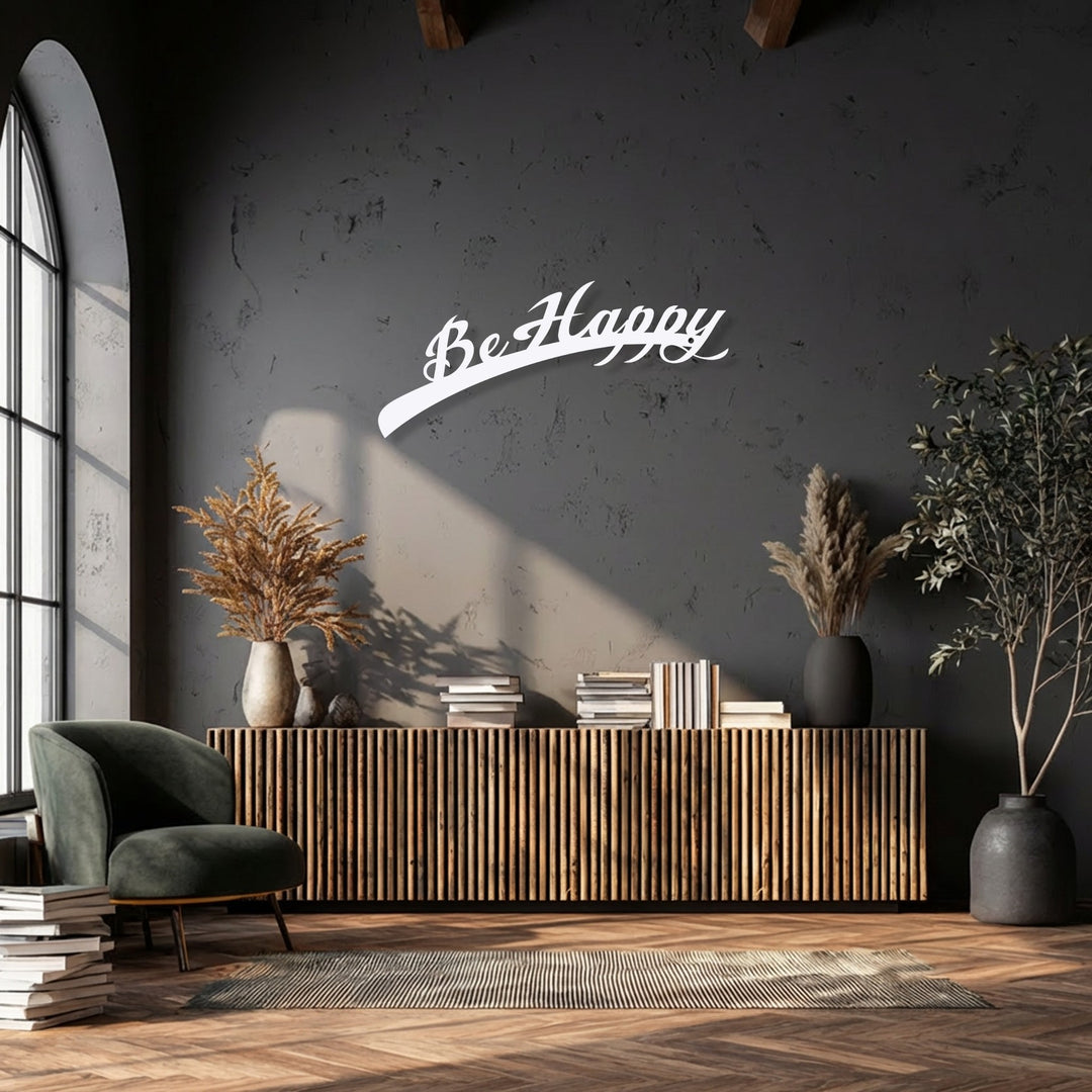 Fluffy dried botanicals nestled in a vase, complementing the elegant Be Happy Script unique metal wall art.