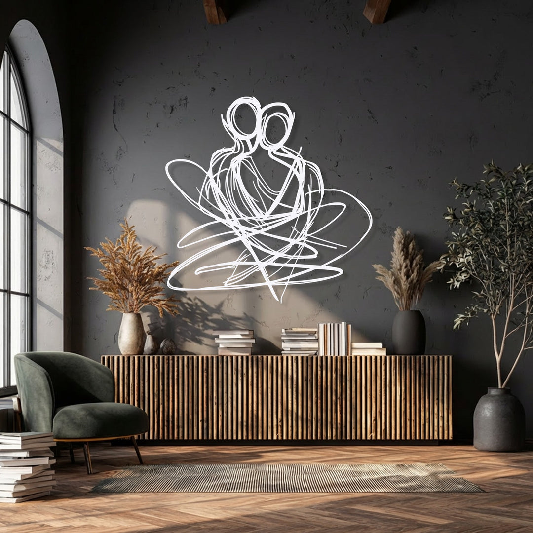 The balanced color temperature of this room, featuring warm sunlit wood and cool dark walls, highlights the abstract couple metal decoration wall art beautifully.