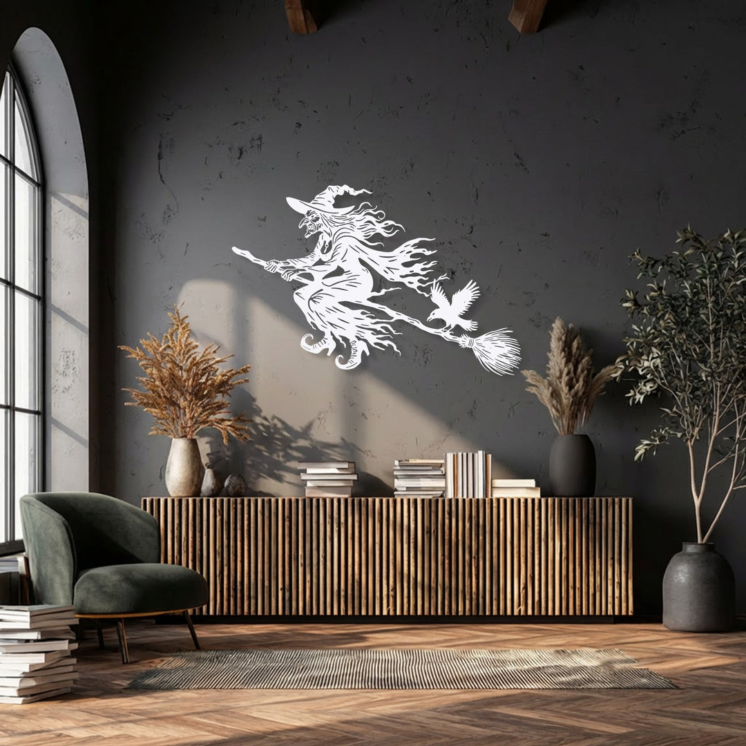 The visual rhythm of the flying witch metal artwork, with its flowing lines and a crow, creates an enchanting Halloween dark decor piece.