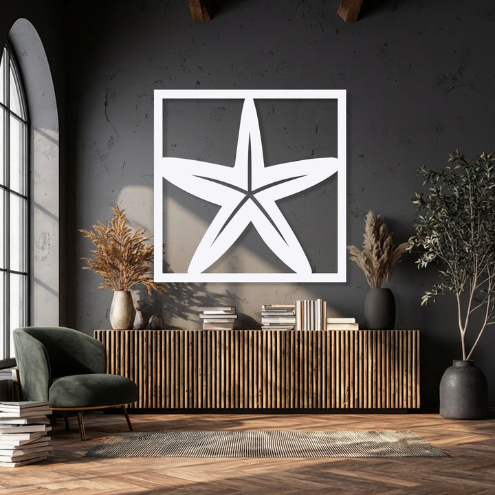 The striking negative space of this white starfish metal art for wall emphasizes its five-pointed coastal frame design.