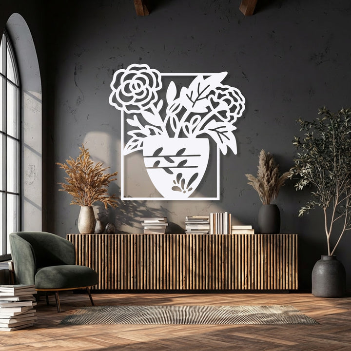 Creating a serene and sophisticated mood, this blooming elegance floral vase decorative metal art beautifully complements the dark, warm-toned interior.