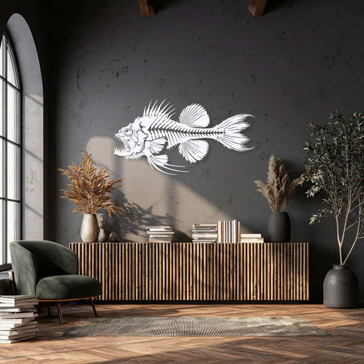 The organic forms of a predator fish skeleton decorative metal art piece dominate a textured wall, flanked by natural dried and live plants.
