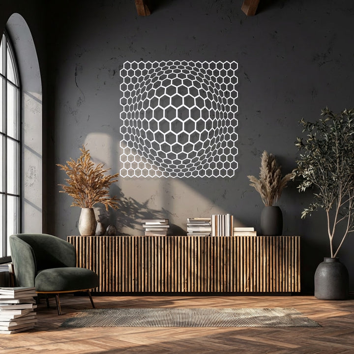 The brightest area showcases a white geometric hexagon depth illusion, a unique metal wall art piece creating a modern focal point.