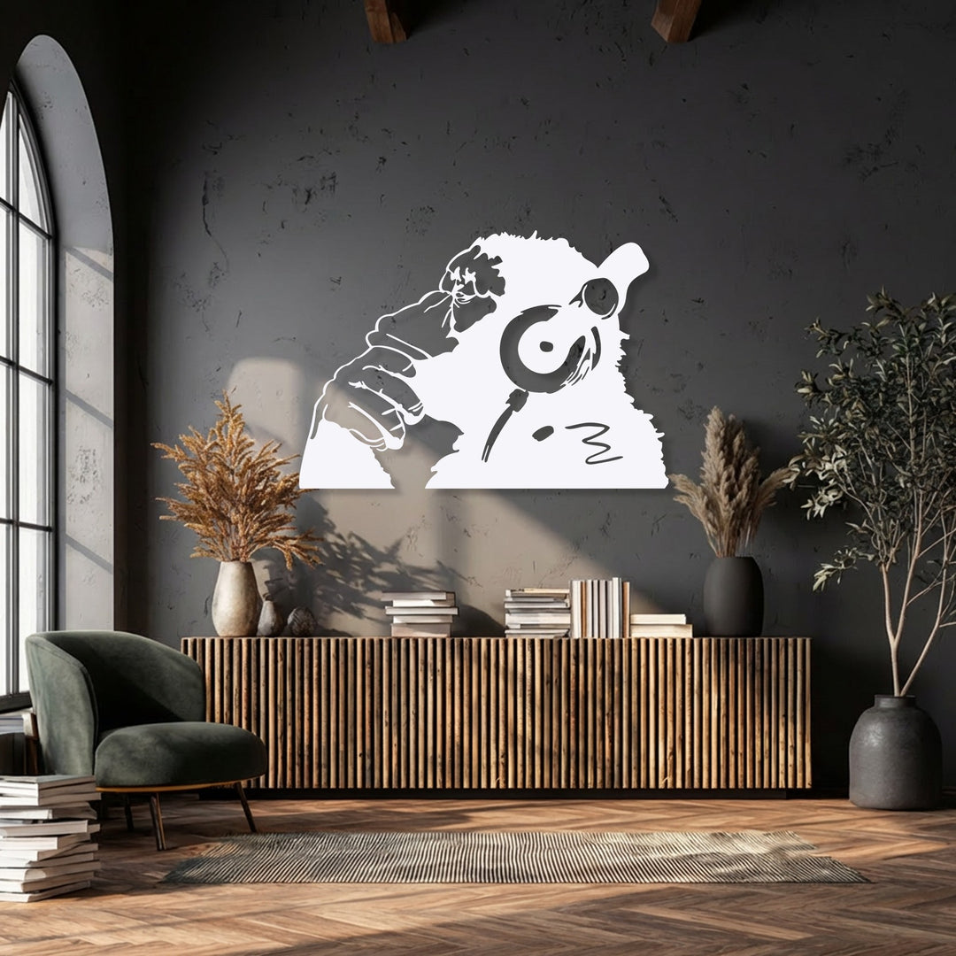 The stark transition between the deep charcoal wall and the crisp white urban monkey headphones metal artwork creates a striking visual.
