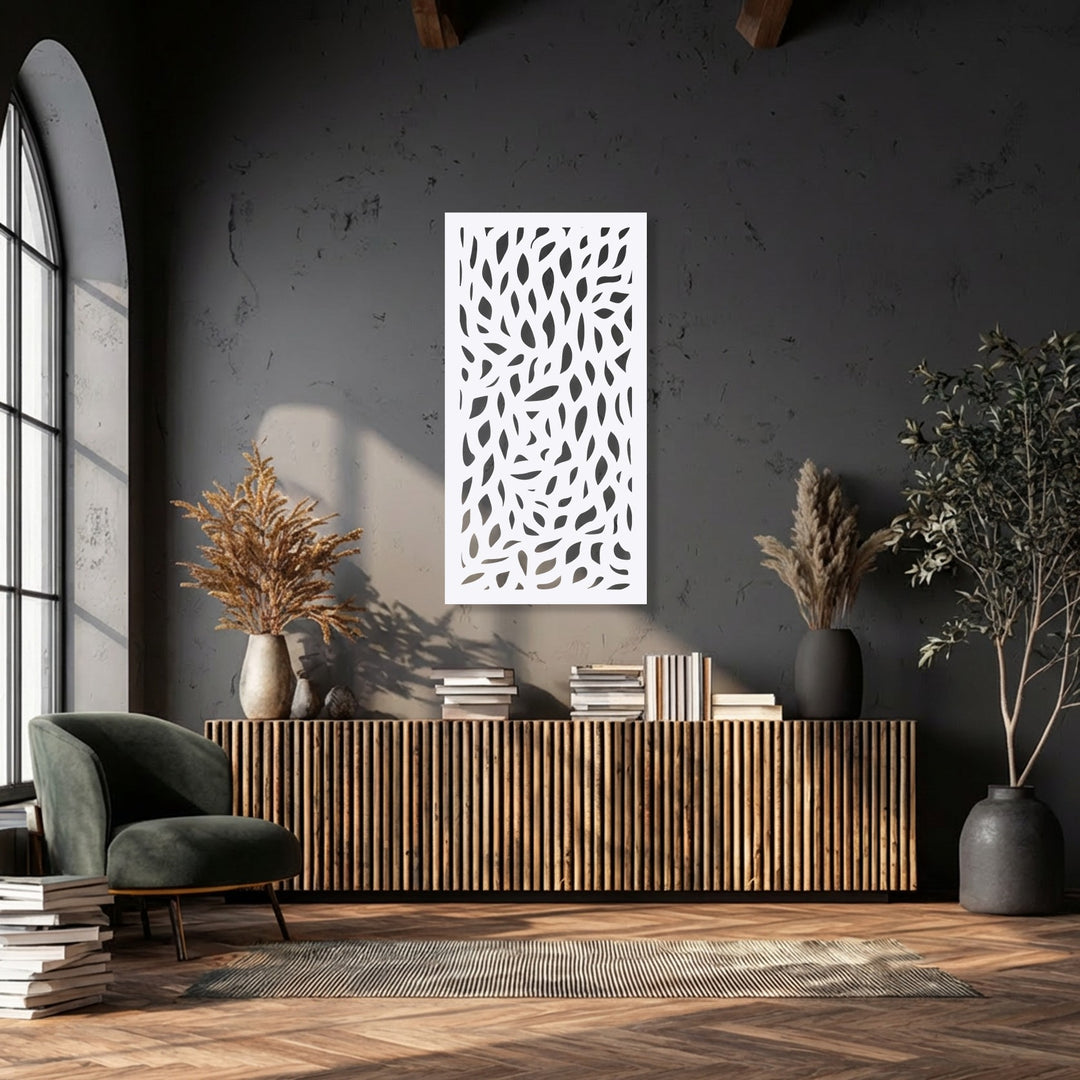 Organic forms of a white abstract leaf pattern panel, acting as striking metal art for wall against a dark textured background.