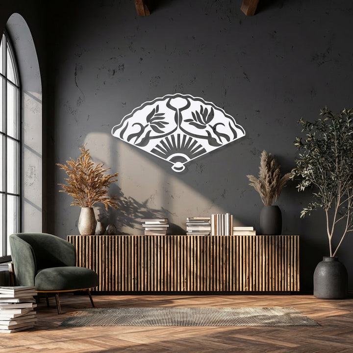 Abstract floral and sun patterns define the elegant Oriental folding fan metal wall decor, providing unique visual interest.