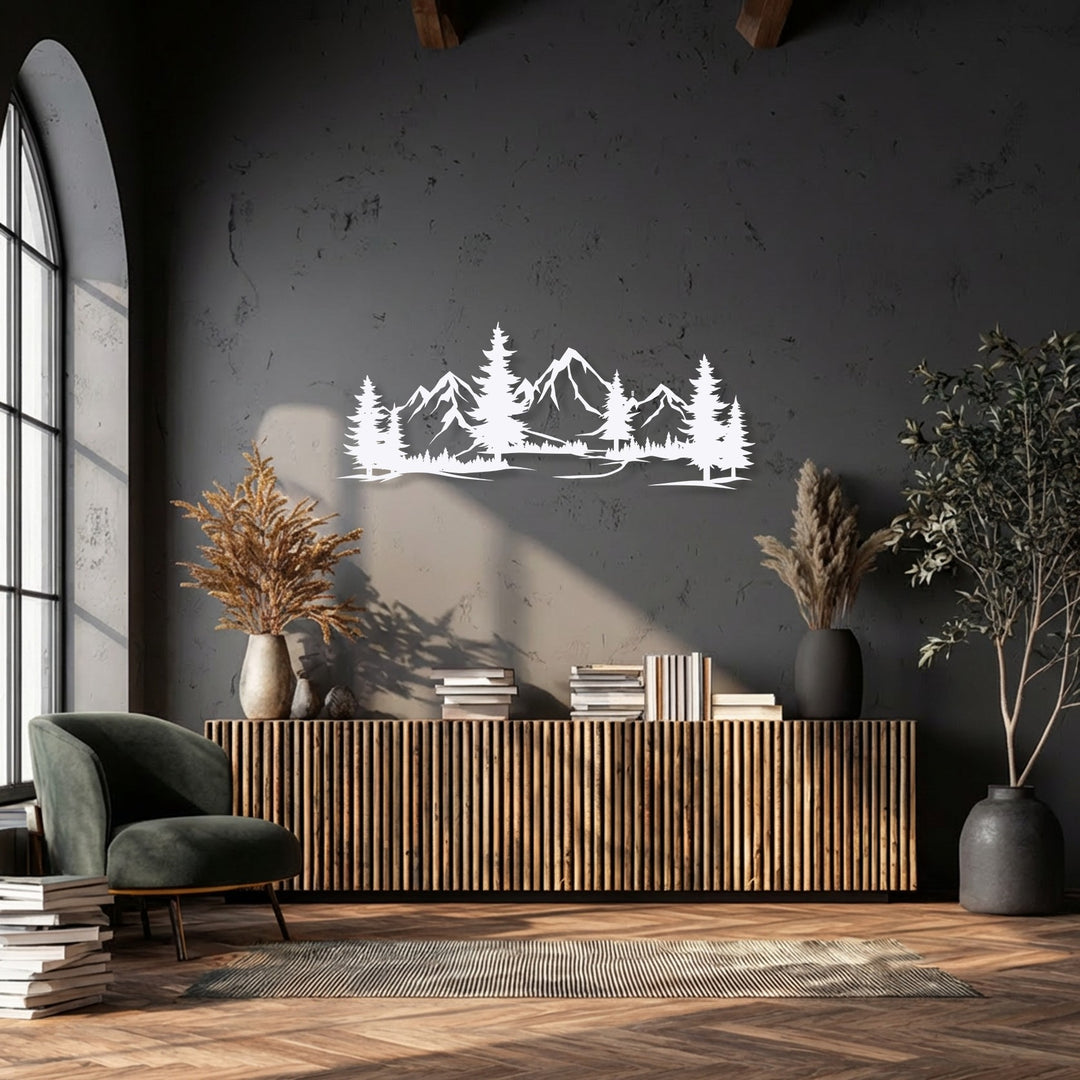 Desaturated mountain forest metal wall decor featuring a panoramic landscape, subtly enhancing a modern interior with muted grays and browns.