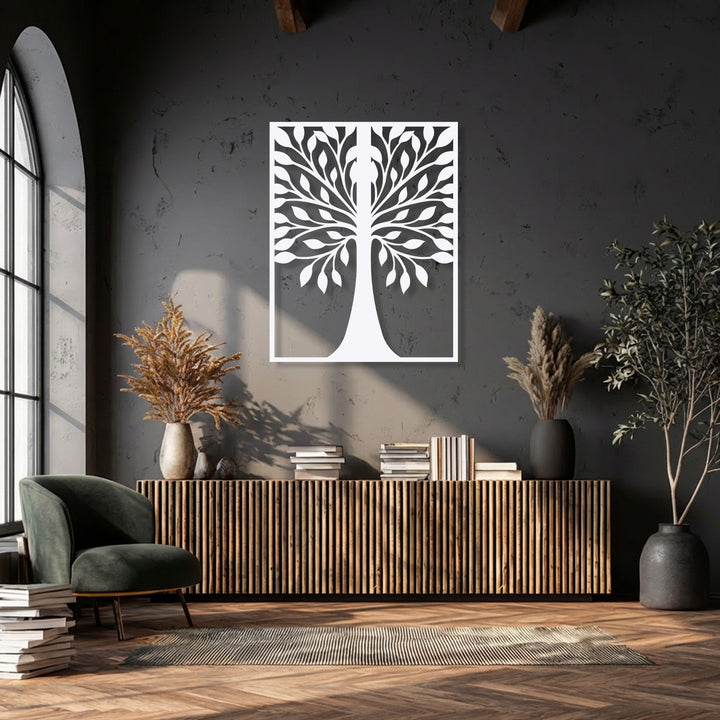 The striking organic forms of a symmetrical leaf tree silhouette metal wall decor piece are prominently displayed against a dark, textured wall.