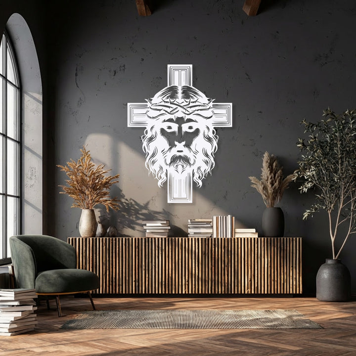 A deeply spiritual and contemplative mood is evoked by the Sacred Cross with Christ metal wall decor, featuring Jesus's face in a modern dark-toned room.