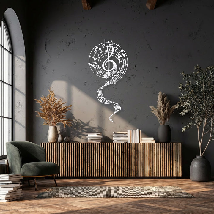 The smooth white finish of the abstract music metal artwork, a flowing melody treble clef, stands out vibrantly against the dark wall.