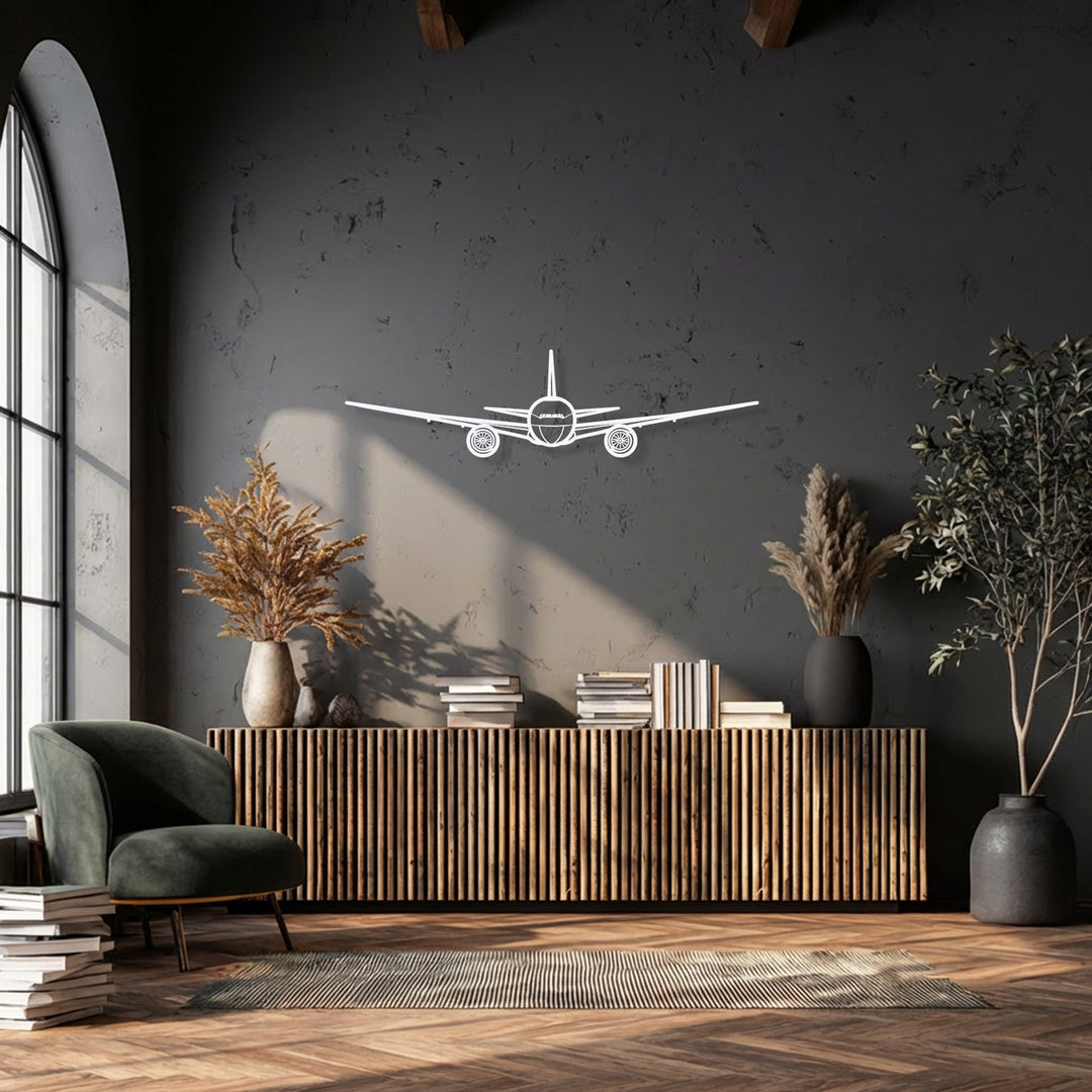 The foreground detail, including a green armchair, books, and wooden cabinet, creates a chic base for decorative metal art.