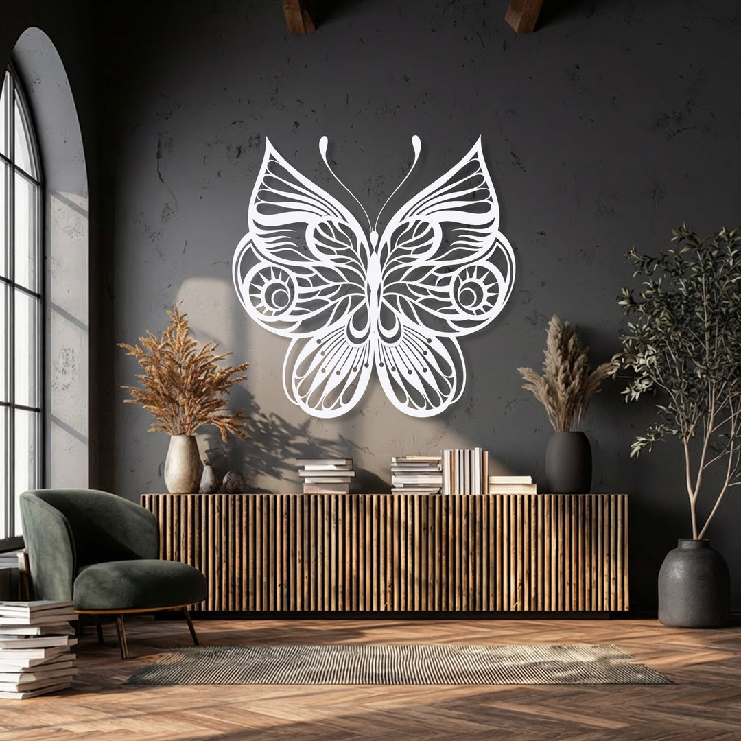 Light and shadow beautifully accentuate the ornate butterfly metal decoration wall art, highlighting its delicate patterns and adding striking depth.