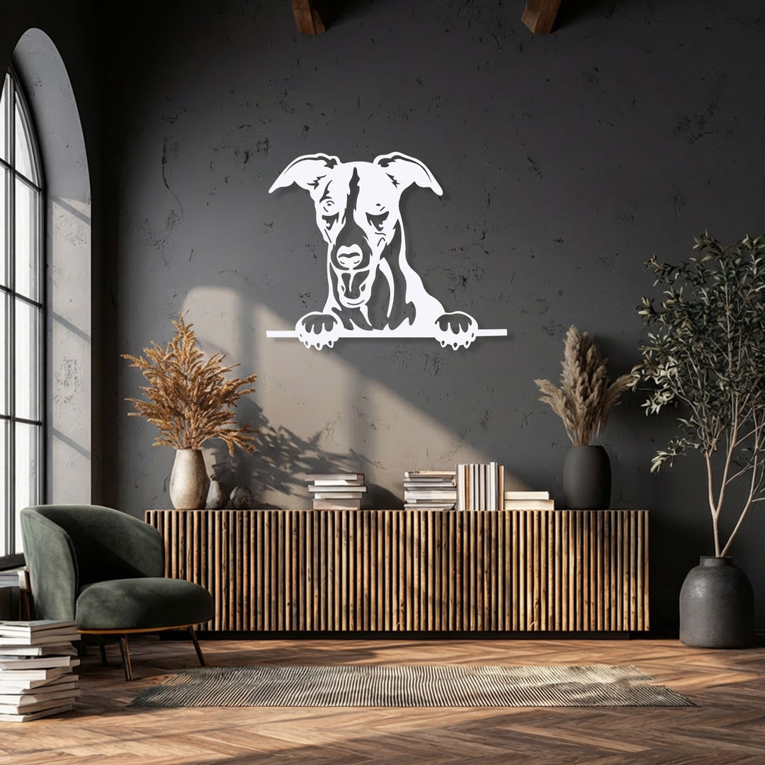 Distressed wall surface texture provides a strong backdrop for the sleek white metal wall decor of a peeking dog silhouette.