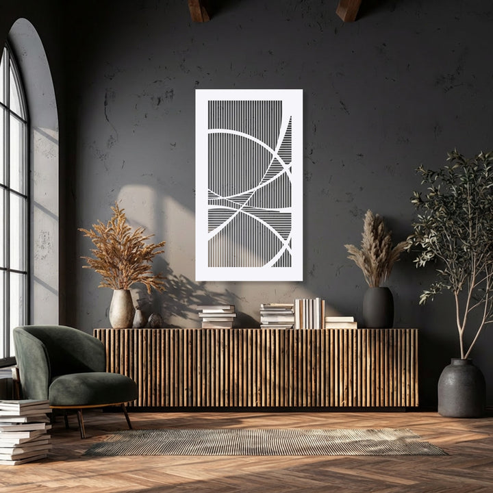 Striking color contrast defines the geometric lines and curves of this modern abstract metal artwork, prominently displayed against a deep charcoal wall.