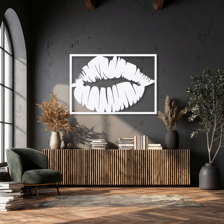 With subdued color saturation, this modern lips metal artwork features a bold kiss silhouette, providing striking contrast in a stylish setting.