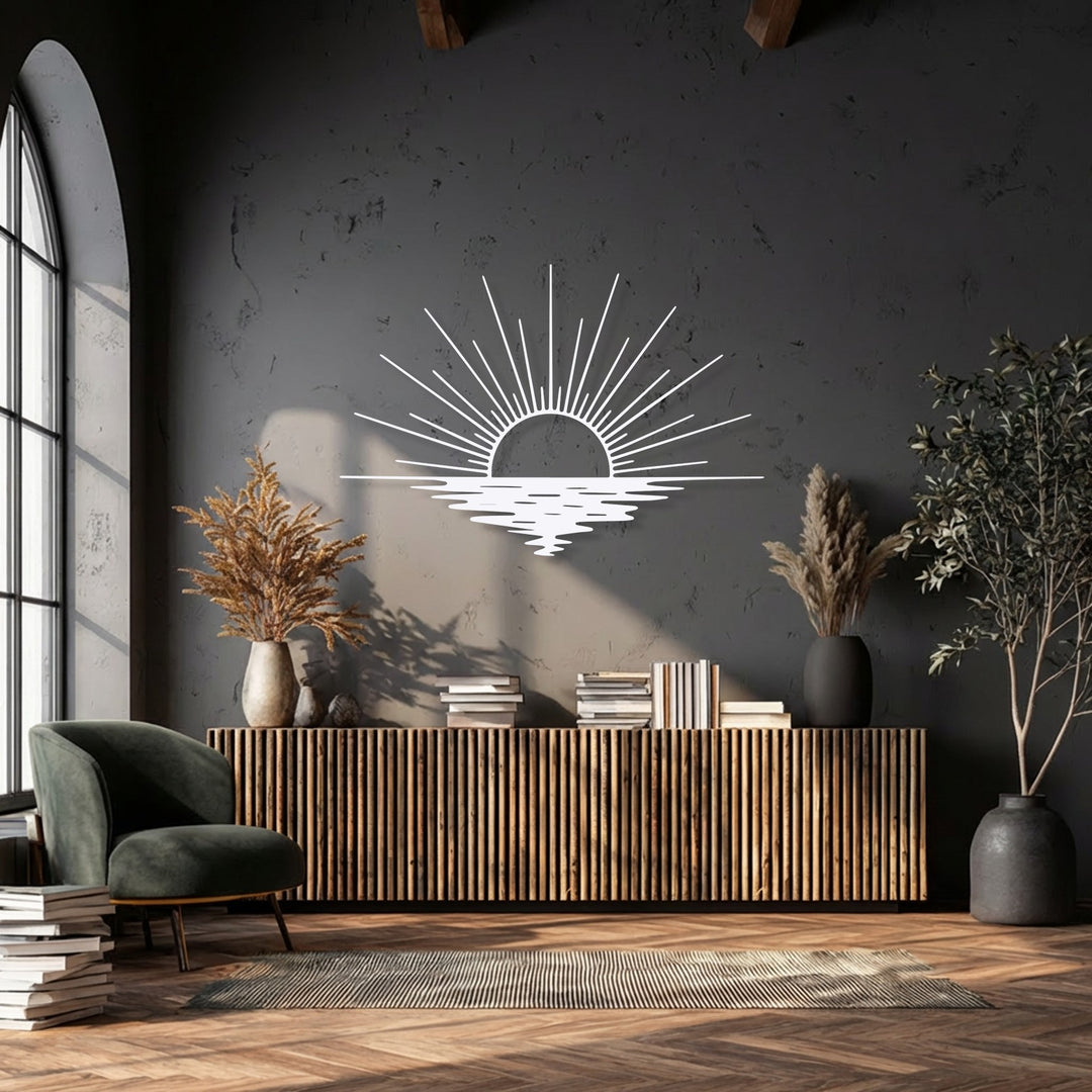 The vast negative space of the dark textured wall beautifully frames the minimal sun rays and ocean reflection of the decorative metal art.