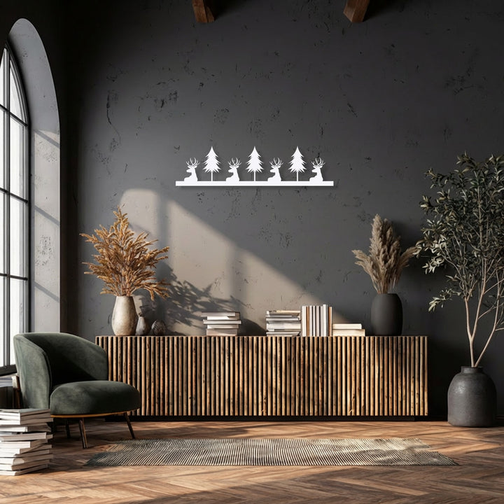 The crisp matte white finish of the deer and pine forest silhouette metal decoration wall art creates a striking contrast.