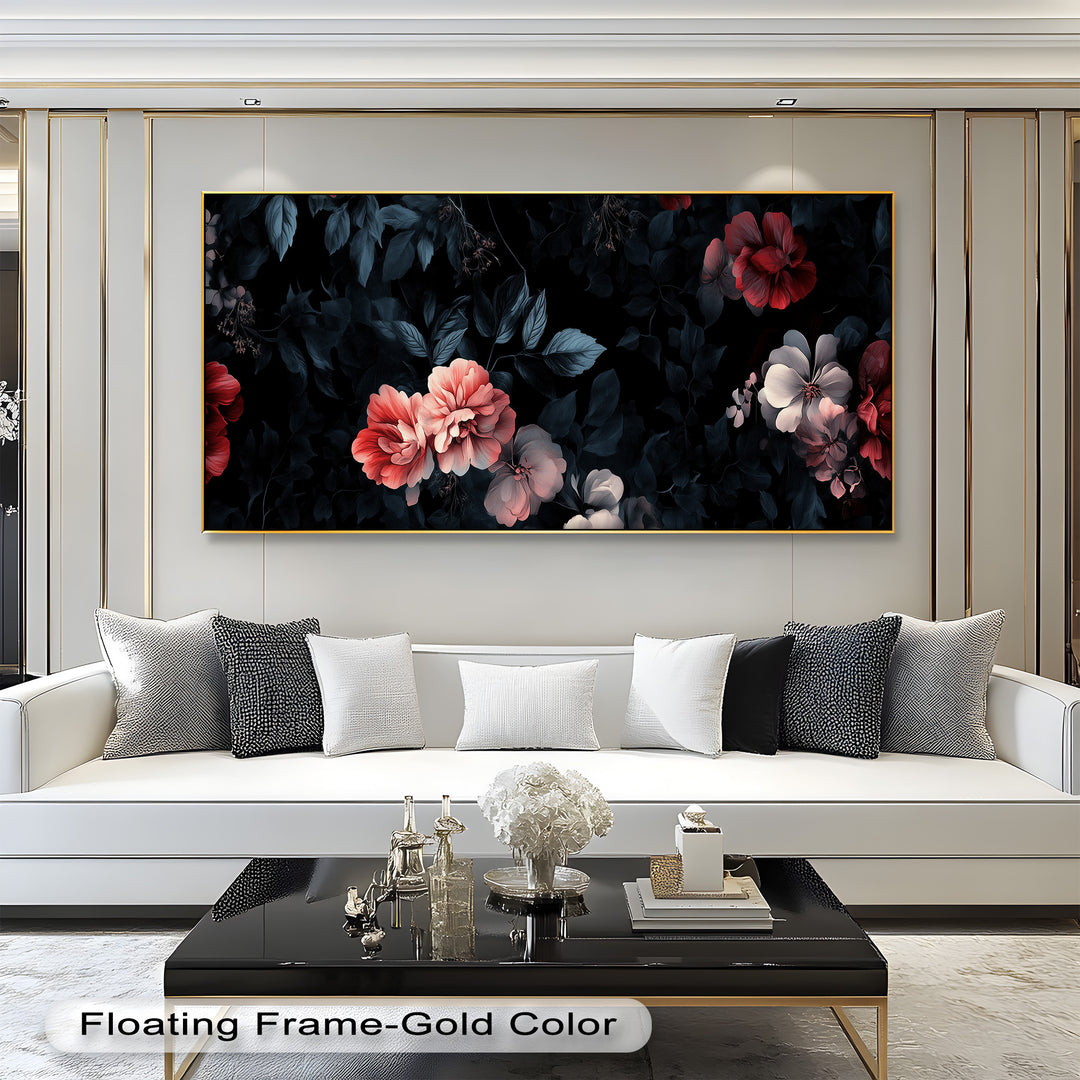 A dramatic floral arrangement featuring soft pink and red blooms set against a dark, moody background with deep blue foliage.