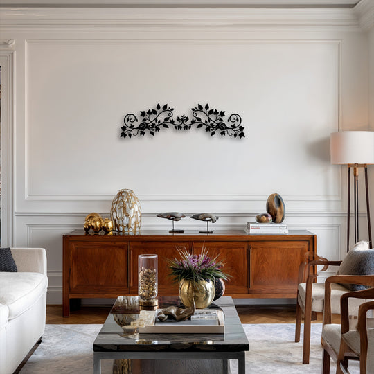The elegant floral vine decorative metal art, featuring an intricate botanical scroll design, serves as the focal point above a rich wooden console.