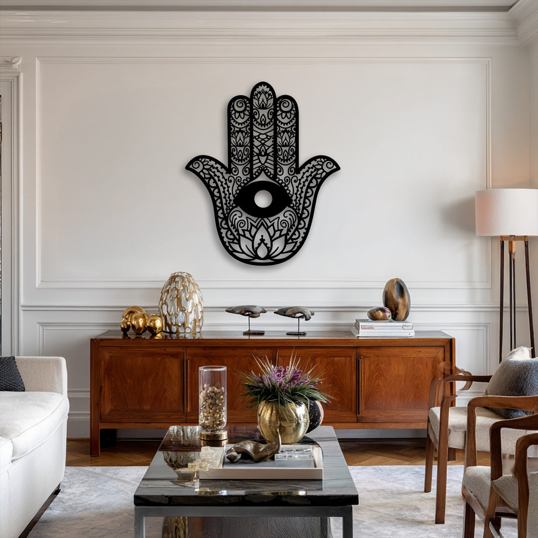 The soft, light grey rug grounds the elegant living space featuring a striking Hamsa Hand evil eye protection metal art for wall.