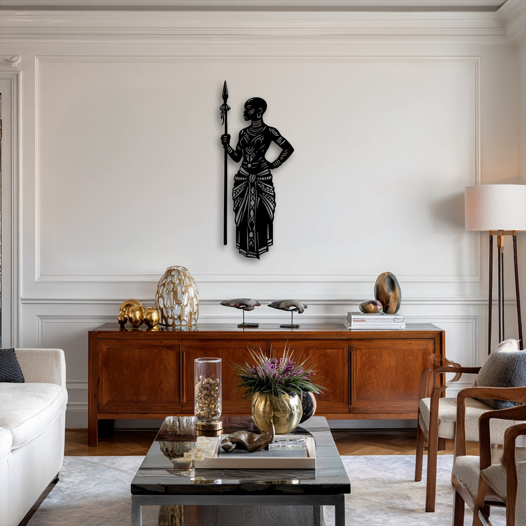 The abstract quality of this unique metal wall art is evident in the stylized black silhouette of an African tribal warrior holding a spear.