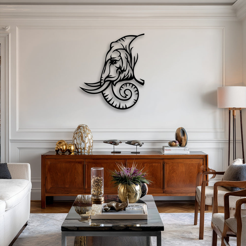 The negative space of the elephant line art metal wall decor highlights its tribal design against a light wall, creating a striking contrast.